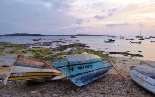 Fisherboats at twilight in the bay of Sal Rei on Boa Vista island