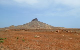 Desert and ancient volcanic chimneys characterize the island interior of Boa Vista